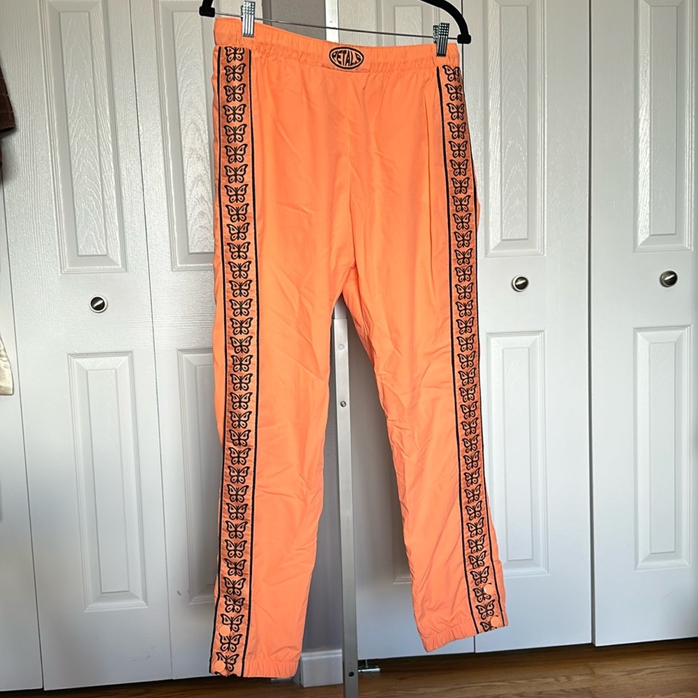 Petals by Petals and Peacocks orange butterfly sweatpants